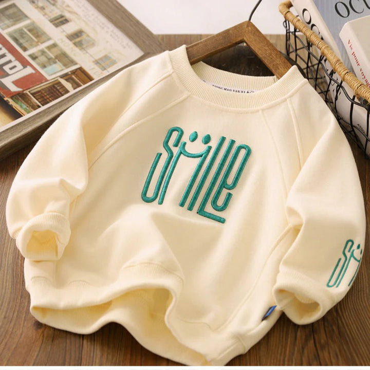 Unisex Children's Sweater Featuring a Cheerful Smile Design